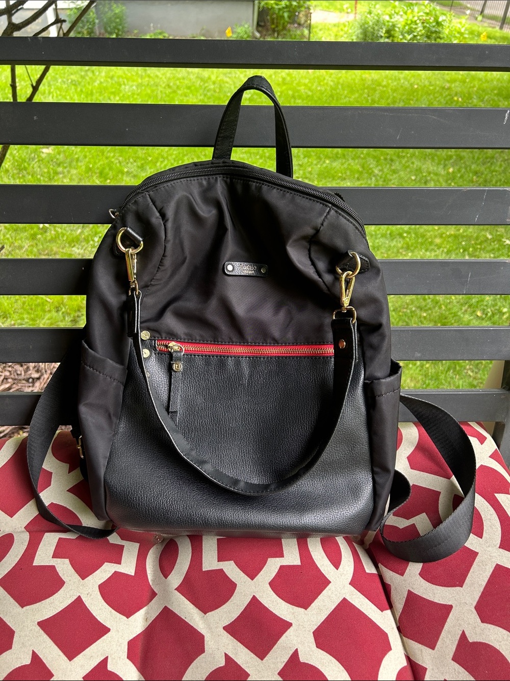 Tutilo Black Nylon & Faux Leather Backpack with Red Zip Accent